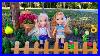 Gardening_Elsa_U0026_Anna_Toddlers_Plant_Flowers_Outdoors_01_vn